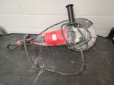 an image of a red and black circular saw