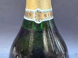 a bottle of champagne that is sitting on a table