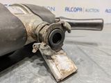 a close up of a exhaust pipe on a metal surface