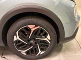 a close up of a car ' s tire on the ground