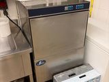 an image of a commercial kitchen with stainless steel appliances