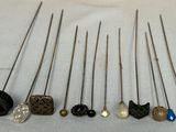 many different types of pins and needles on a table