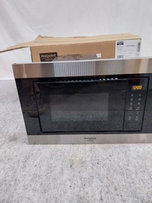 Vente d'un four à micro-ondes neuf, avec son emballage d'origine et sa notice d'utilisation