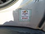 a sticker on the front of a car that says eva tachy