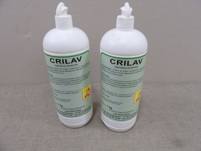 two bottles of crilav are sitting on a table next to each other