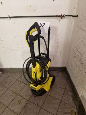 a yellow and black pressurer on the floor in a room