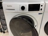 two washers and a dryer stacked on top of each other in a store
