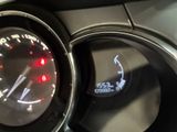 a close up of a speedometer on a car ' s dashboard