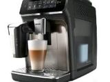 an image of a coffee machine with a cup of coffee in front of it