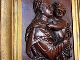 a picture of a statue of a woman holding a child