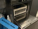 an image of a kitchen with a sink and a dishwasher