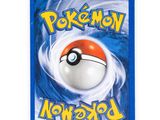 a close up of a card with a pokemon ball on it