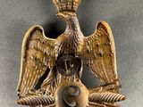 an image of an eagle with a crown on it ' s head