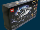 a black box with a lego batmobile in it