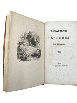 an open book with a drawing of a man and a woman in a garden
