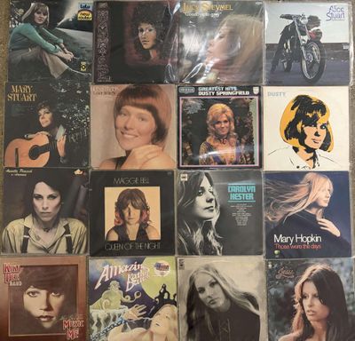 a lot of music cds that are on the table