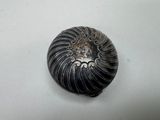 an image of a metal object with a spiral design on it