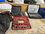 a lot of tools that are sitting on the floor