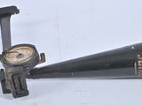a small black cone with a clock on it