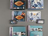 many video games that are sitting on a table