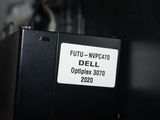 a close up of a dell computer with a label on it