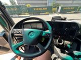a steering wheel and dashboard of a truck