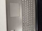 a laptop that is open on a table