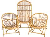 two chairs made out of bamboo are sitting next to each other