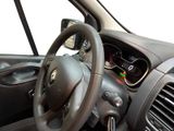 dashboard of a car with a steering wheel and dashboard controls