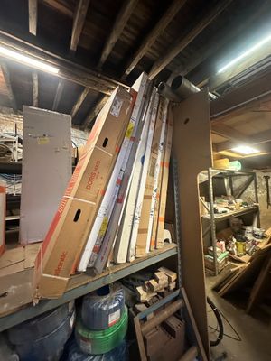 a room filled with lots of boxes and other items