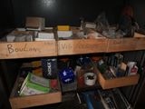 two wooden shelves with boxes on top of them that have writing on them