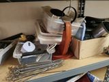 a cluttered shelf with many different items on it
