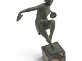 an image of a bronze statue of a woman holding a basketball ball