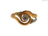 une image d'une bague en or avec un diamant au milieu