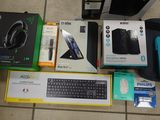 a lot of electronic items on the floor next to each other