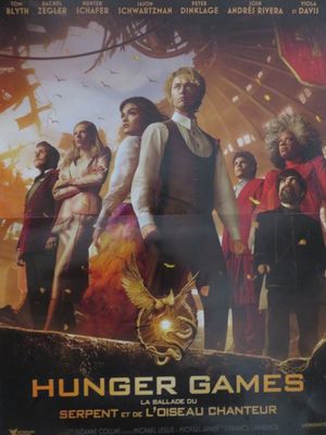 l'affiche du film « Hunger Games » accrochée au mur d'un immeuble
