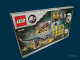 a box of legos with a picture of a t - rex on it