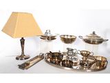 a silver tray with a lamp and a lamp shade on it