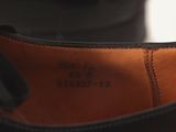 a close up of a pair of shoes that are on a table