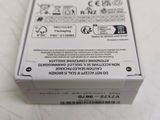 a white box with a black and white label on it
