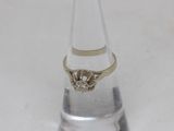 an image of a diamond ring on a clear glass