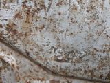 a close up of a rusted piece of metal