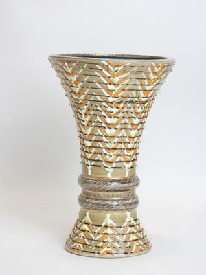 silver and gold vase on white background with white background