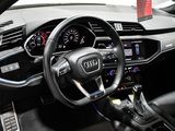 steering wheel and dashboard of a car in a showroom