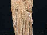 statue of a woman holding a child in her arms