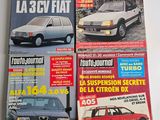 three magazines of different cars on a white surface