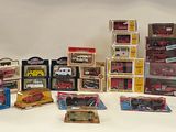 a lot of toy cars and boxes on the table