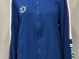 a woman ' s blue jacket with a white and red stripe on the side