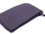 black leather zipped wallet with a logo on the front