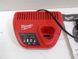 a red machine that is sitting on a table